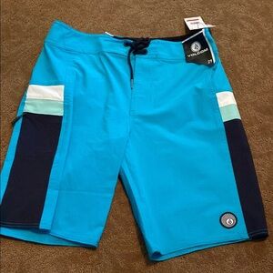 Volcom Men's Blue Swim Shorts size 29, 18 
New with tags pocket board shorts